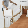 Snuzpod 4 Bedside Crib in Natural featuring the Lift-Off Bassinet for Easy Portability