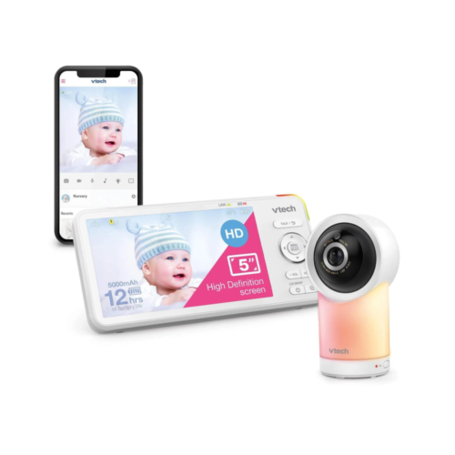VTech baby monitor set with 5" HD screen, camera unit, and phone app displaying a baby.