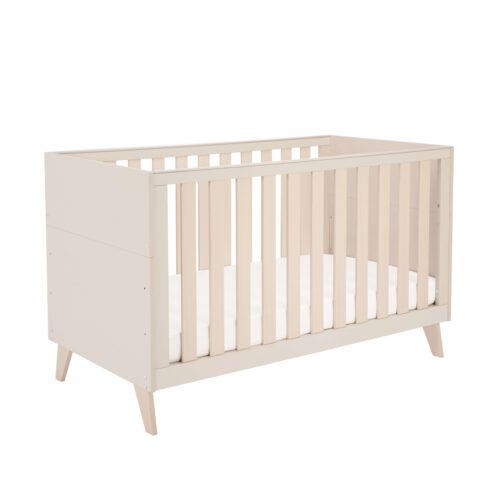 Angled view of Babymore Dante Cot Bed showing toddler bed setup with safety side panel.