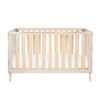 Studio view of Babymore Dante Cot Bed in classic cot setup with a smooth cashmere finish.