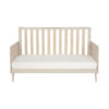 Front-facing studio image of Babymore Dante Cot Bed showcasing its slatted side rails.