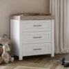A Nursery featuring the Silver Cross Valencia Dresser in White & Natural Ash
