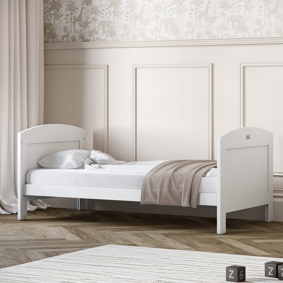 Nursery room featuring a Silver Cross Valencia Cot Bed in White & Natural Ash configured as a toddler bed