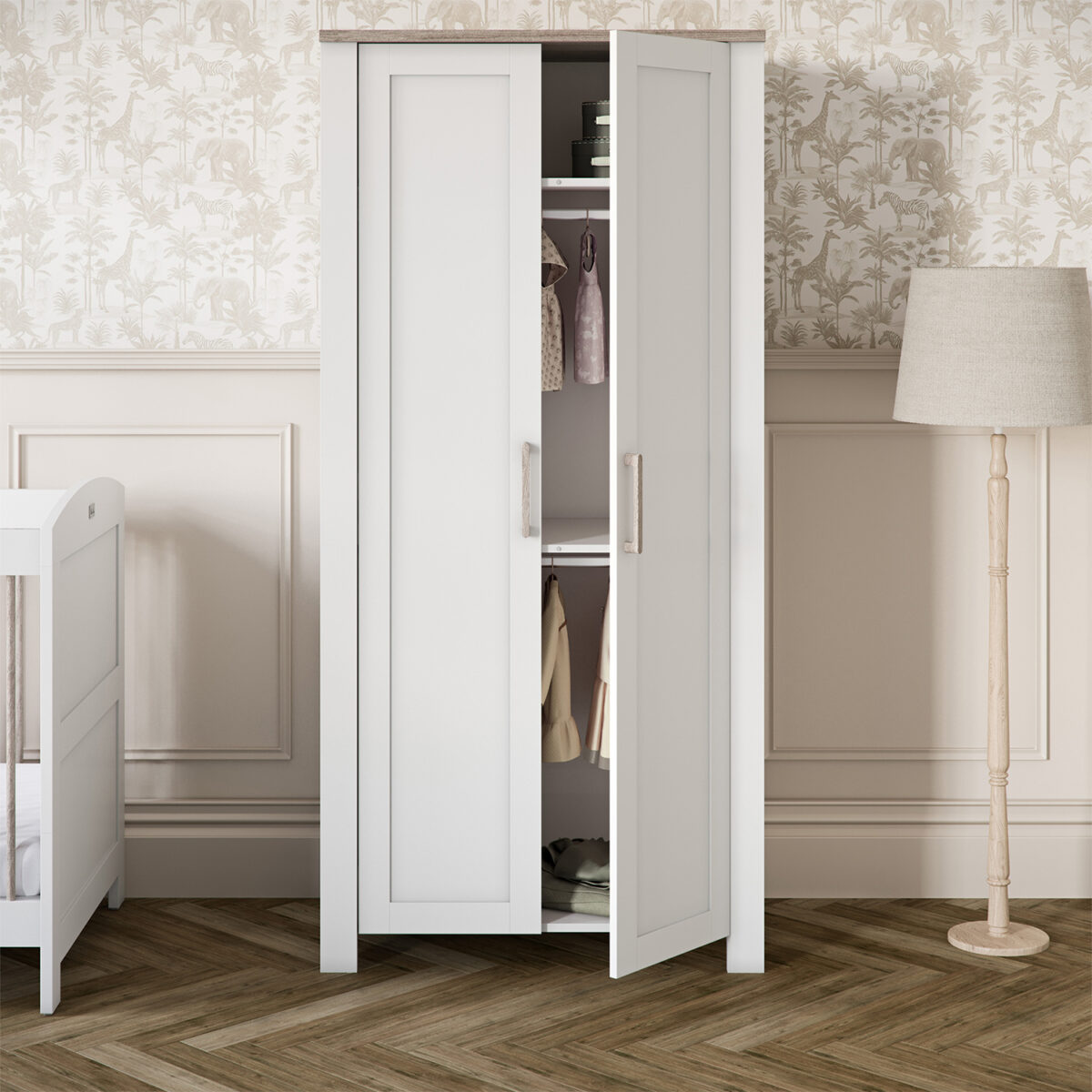 Nursery room featuring the Silver Cross Valencia Wardrobe in White & Natural Ash with with one of the doors open.