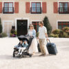 Uppababy-Minu-Duo-Twin-Pushchair-Jake-Black-Lifestyle-009-Two-Children-Upright-Seats-Extended-Hoods-Abroad-Summer-Holiday-Travel