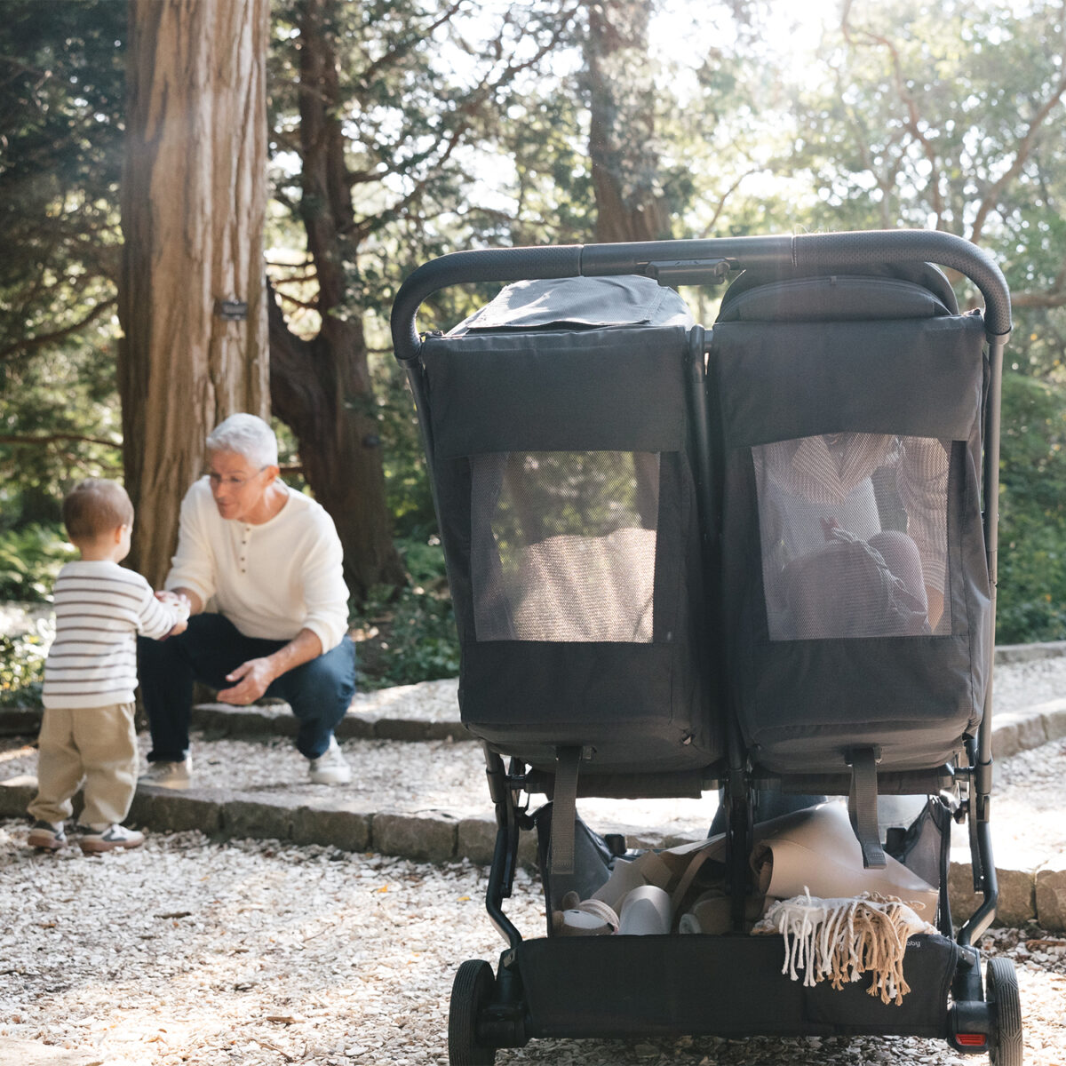Uppababy-Minu-Duo-Twin-Pushchair-Jake-Black-Lifestyle-017-Seats-Fully-Reclined
