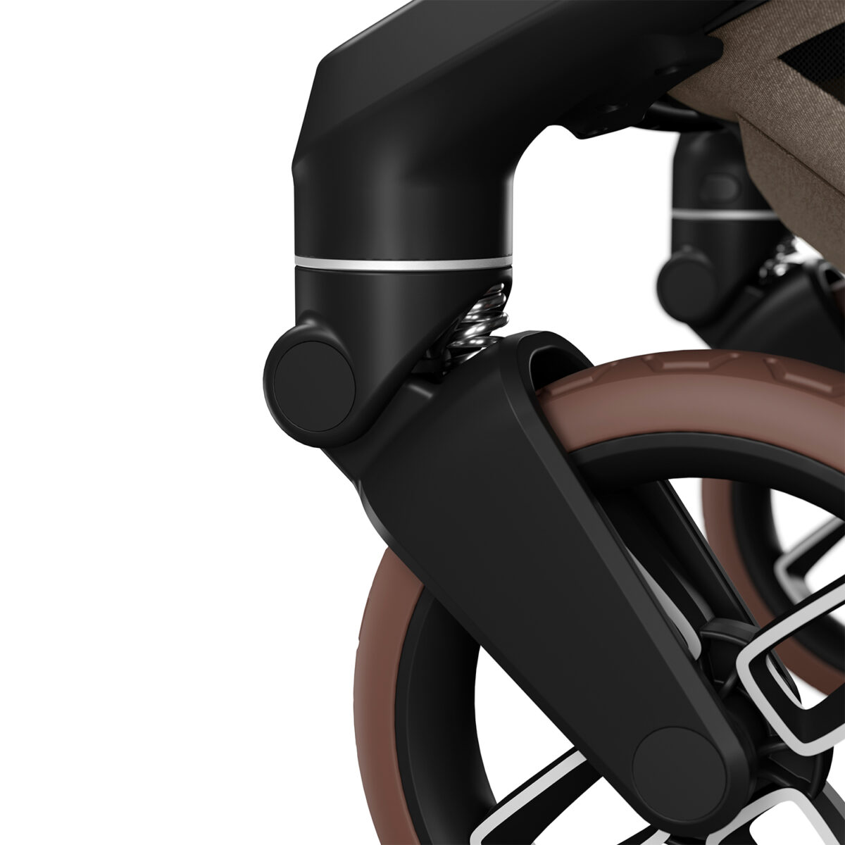 Maxi-Cosi stroller wheel close-up with smooth suspension and all-terrain tyre in brown and black.