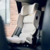 Side view of AXKID Up High Back Booster Car Seat showing seat padding and safety features