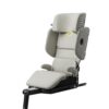Angled view of beige Axkid Up booster seat showing Isofix system and adjustable headrest.