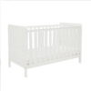 Side angle of white cot bed with slatted design and clean modern lines.