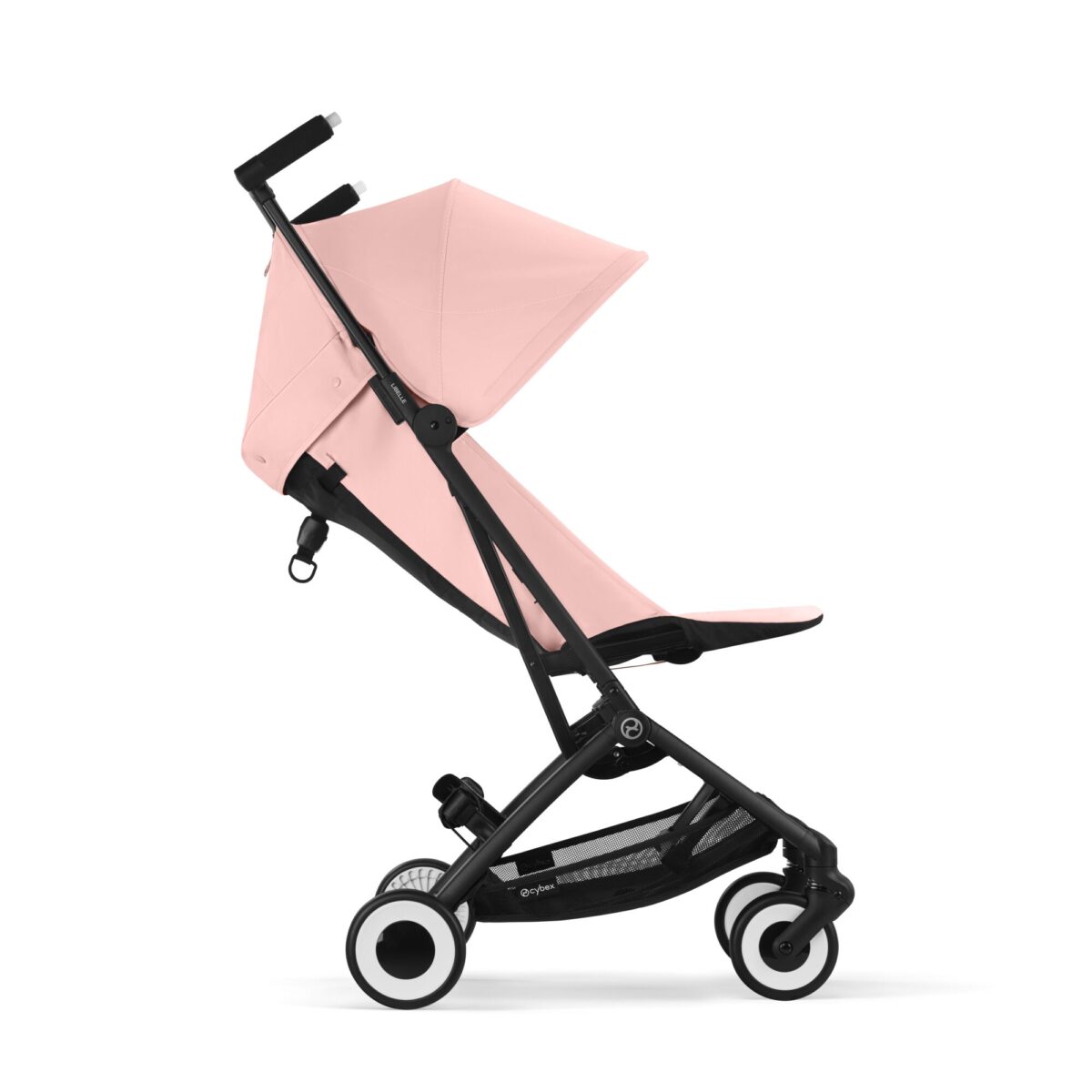 Side profile of Cybex Libelle stroller in Candy Pink in upright position with smooth wheels and mesh storage basket.