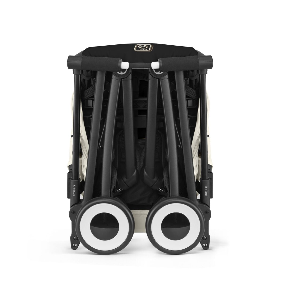 Folded Cybex Libelle stroller in Canvas White showcasing ultra-compact, travel-friendly design and sturdy build.