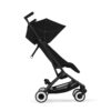 Side profile of Cybex Libelle stroller in reclined position with canopy extended and smooth wheels.