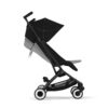 Cybex Libelle Magic Black stroller showing recline function and seat adjustment mechanism.