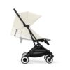 Side view of Cybex Orfeo stroller with adjustable canopy in Canvas White and a reclined seat position.