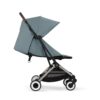 Side view of Cybex Orfeo stroller in Stormy Blue with a compact design and mesh storage basket.