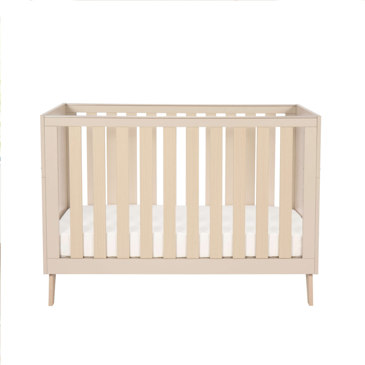 Studio view of Babymore Dante Mini Cot Bed in cot setup featuring a neutral cashmere finish.