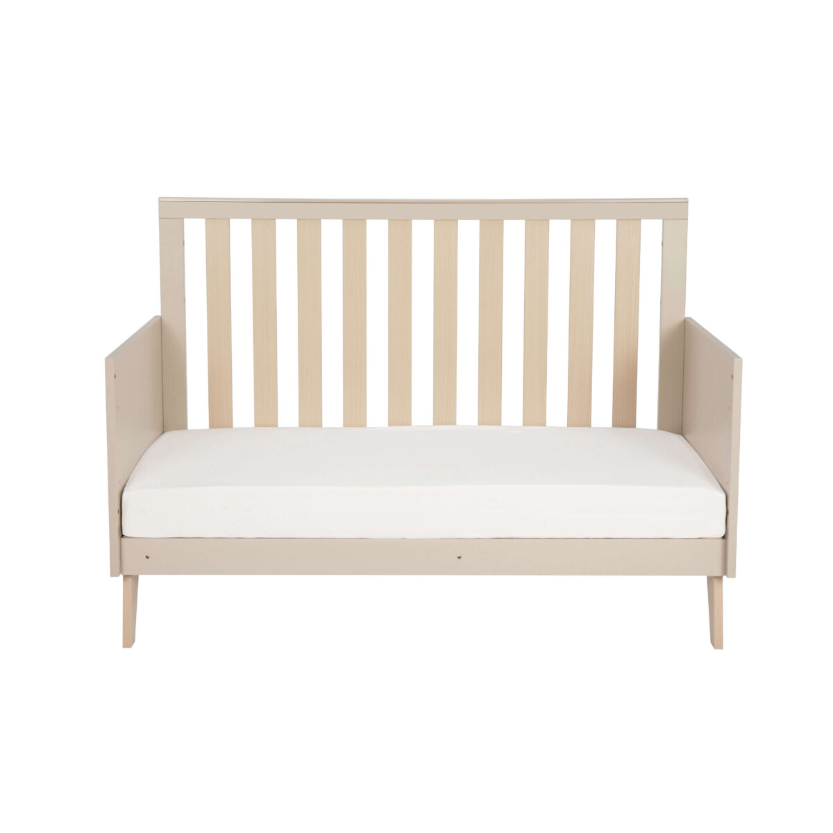 Babymore Dante Mini Cot Bed in day bed mode showing vertical slats and smooth cashmere frame.