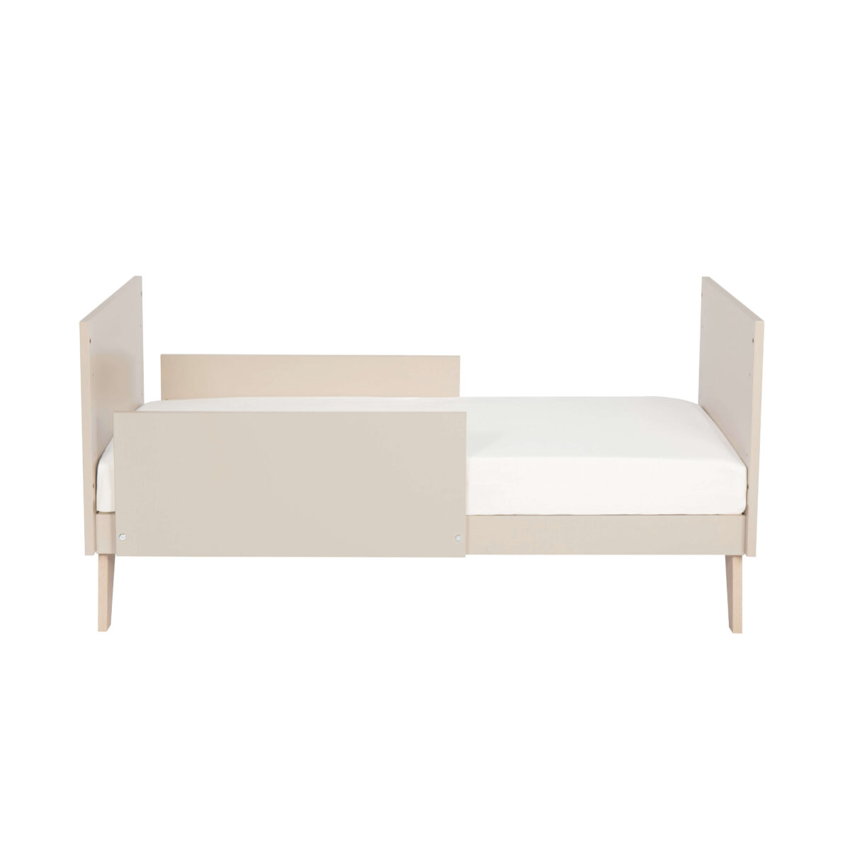 Babymore Dante Mini Cot Bed converted to toddler bed with safety panel and modern look.