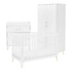 Cot bed, dresser, and wardrobe set shown on white background with matching gold accents.