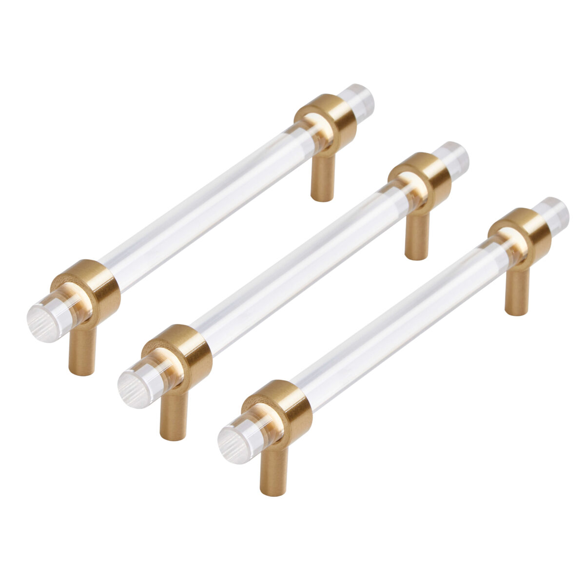 Three clear acrylic and gold handles shown diagonally on a white background.