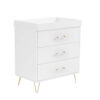 Angled side view of white chest changer with acrylic and gold drawer handles.