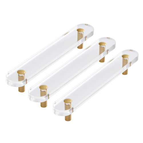 Set of three flat clear acrylic handles with gold metal mounts on a white background.