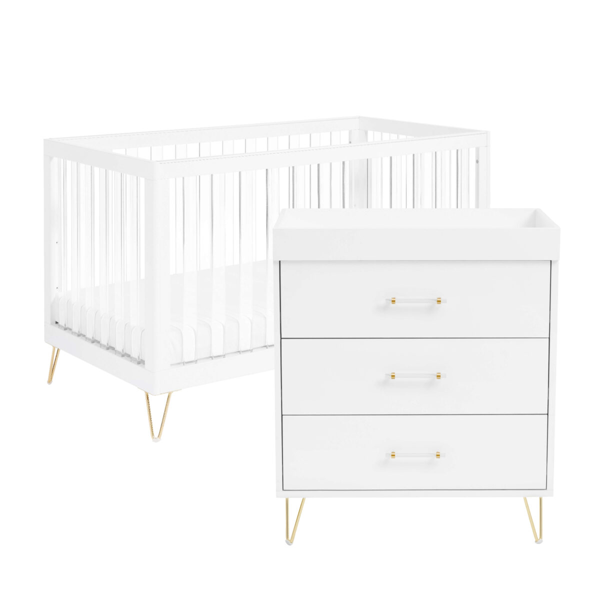 atching white crib and dresser with gold legs shown on a plain white background.