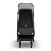 Front view of the UPPAbaby MINU V3 stroller in Greyson with harness and footrest visible.