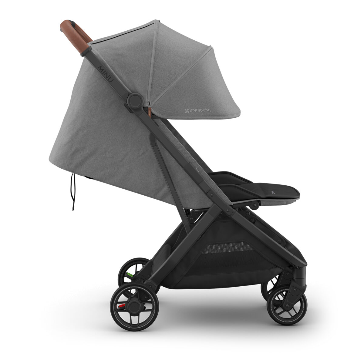 Side profile of Greyson UPPAbaby MINU V3 stroller with fully extended canopy and reclined seat.