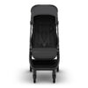 Front view of the UPPAbaby MINU V3 stroller in Jake with harness and footrest visible.