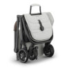 Savannah UPPAbaby MINU V3 stroller folded with carry handle on top for easy transport.