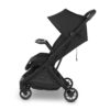 Side view of black UPPAbaby stroller featuring installed snack tray with cup holder.
