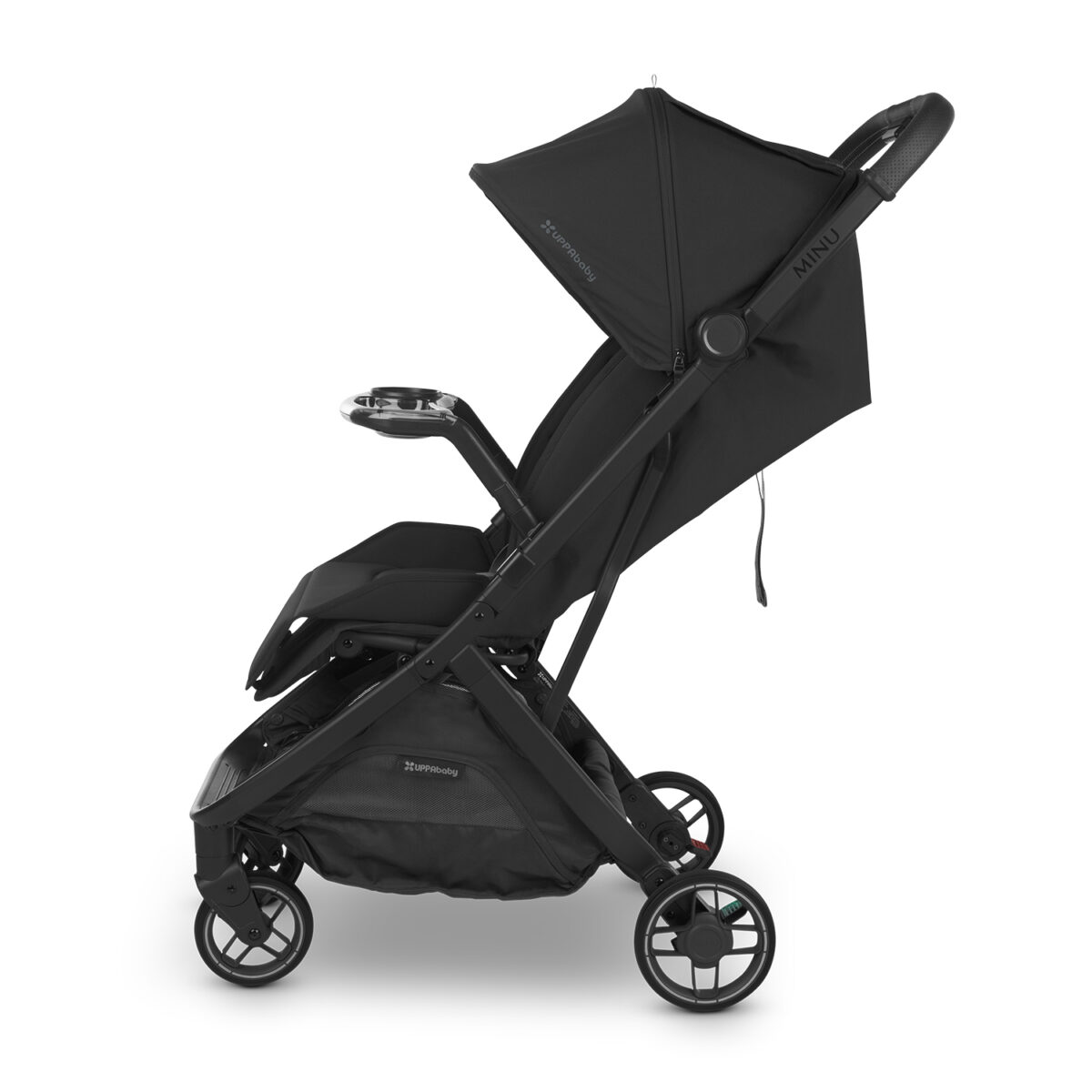 Side view of black UPPAbaby stroller featuring installed snack tray with cup holder.