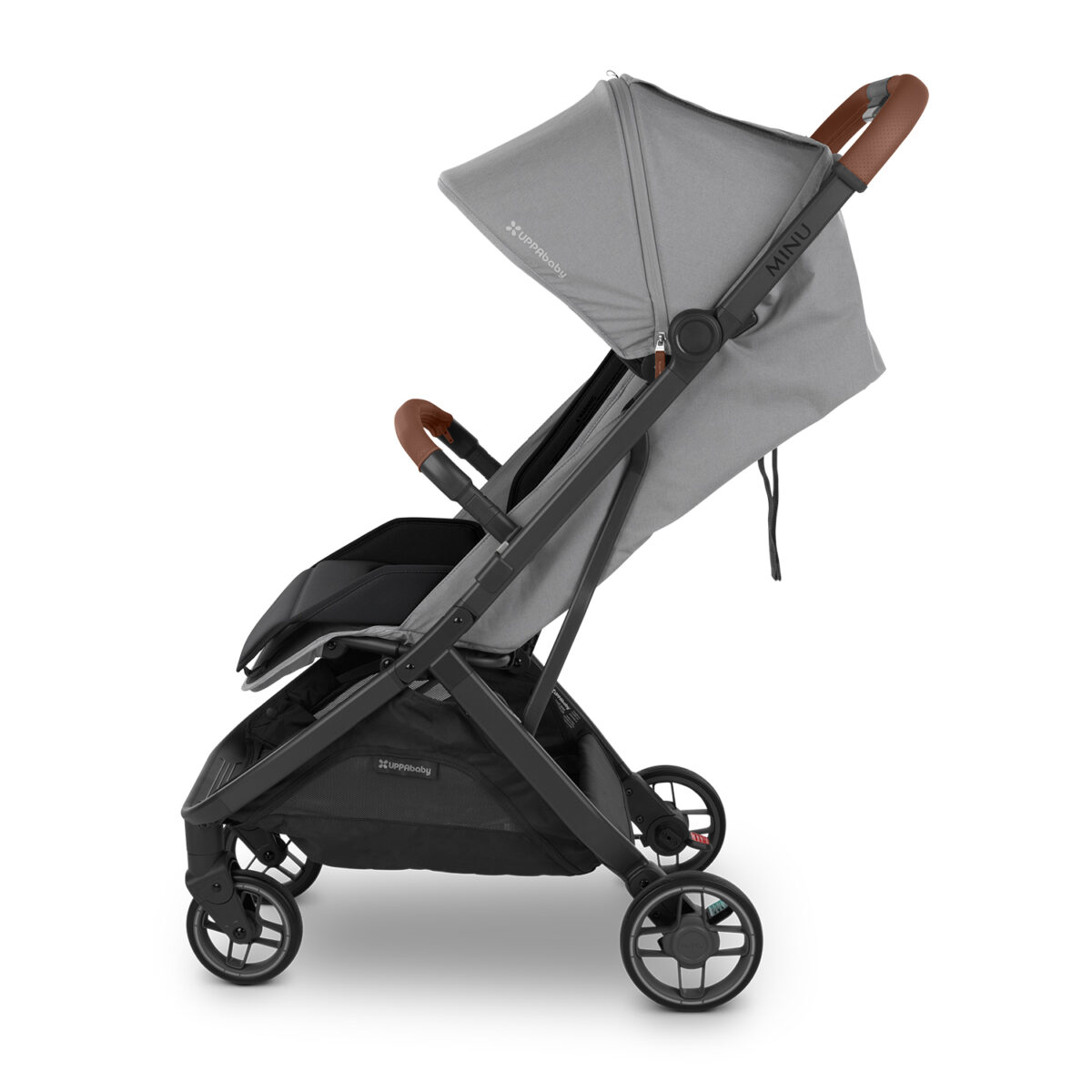 Side view of grey UPPAbaby stroller with brown leather handlebar and bumper bar.