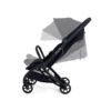 Stroller shown with canopy and seat in multiple adjustable positions.