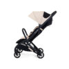 Side view of latte iCandy stroller with extended canopy and upright seat.