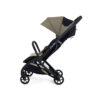 Side view of sage iCandy stroller with extended canopy and upright seat.